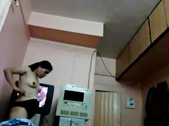Small tittied Indian chick shows off her small breasts