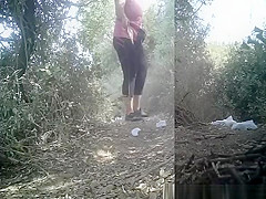 Sports women peeing outdoors