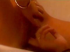 Stunning Lesbian Sluts With Big Breasts Love To Lick Their Clits In Shower Stall