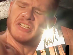Sub stud fisted during BDSM fetish scene