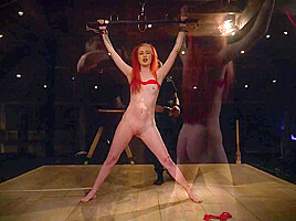 Submissive redhead slave tied up and fucked hard