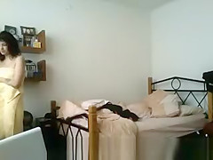 Tattoed girl in bedroom after shower
