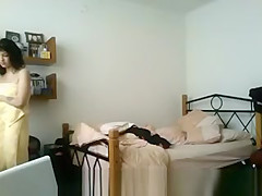 Tattoed girl in bedroom after shower