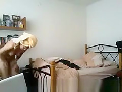 Tattoed girl in bedroom after shower