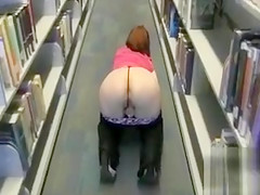 Tattooed girlfriend with big jugs flashing in the city library