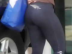 Tight workout pants look good on her ass