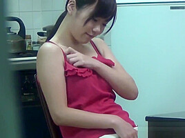 Tiny asian rubs her pussy