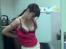 Tiny asian rubs her pussy