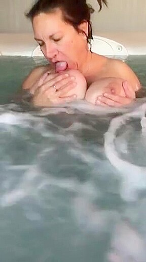 Tit play in hot tub