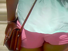 Tourist girl with hot ass in pink shorts