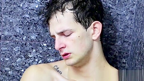 Tugging on his wet cock and moaning in the shower all alone