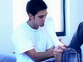 Twink Ricardo and Marcello take off socks and sucking toes