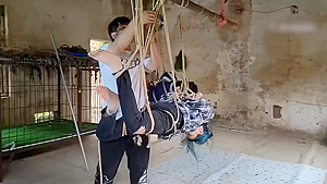 Two Girls Suspended In An Abandoned House