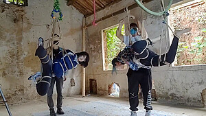 Two Girls Suspended In An Abandoned House