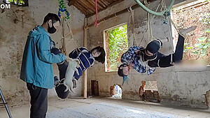 Two Girls Suspended In An Abandoned House