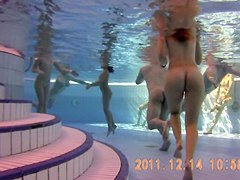 Underwater scenes of the nude chicks in the sauna pool