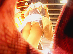 Upskirt inside a jeans miniskirt while walking