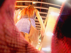 Upskirt inside a jeans miniskirt while walking