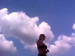 Voeyer video of bimbo in sexy bikini on the beach PICT0015