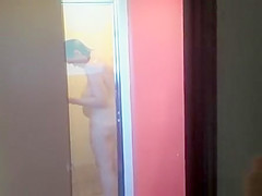 Wife secretly filmed shaving in shower
