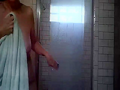 Wife shaving in shower