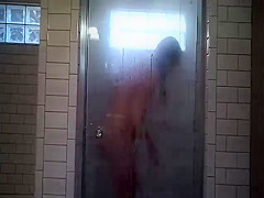 Wife shaving in shower