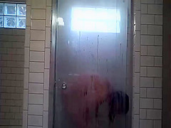 Wife shaving in shower