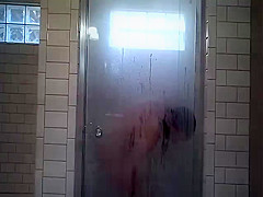 Wife shaving in shower