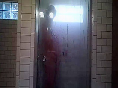 Wife shaving in shower
