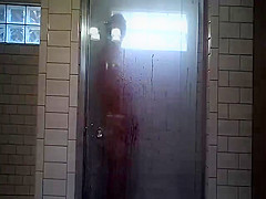 Wife shaving in shower