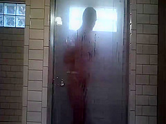 Wife shaving in shower