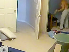 Wife undressing in the bedroom