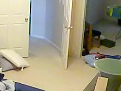 Wife undressing in the bedroom