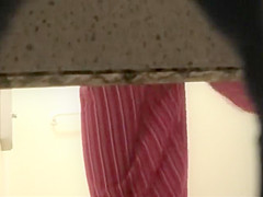 Woman showers with a luffa