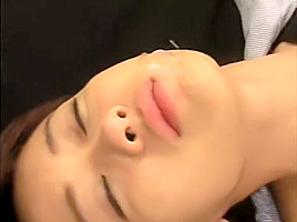 Young Asian cutie in a maid costume gets cum all over her lovely face