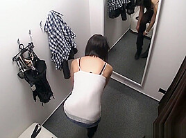 Young Girl Fitting Bra in Shopping Mall