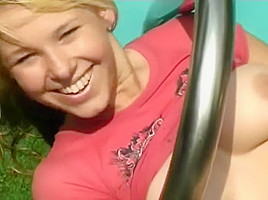 Young and Busty Kessy masturbates in pool