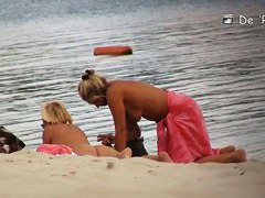 spies on a perky breasted MILF on a nudist beach