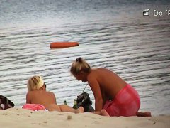 spies on a perky breasted MILF on a nudist beach