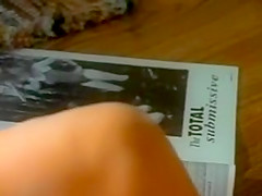 woman is reading a dirty magazine 